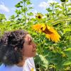 Maria Requena and a sunflower