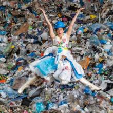 Dancer Lynne Neuman covered in plastic garbage