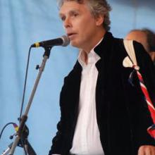 photo of David Massengill singing at the microphone